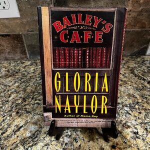 Bailey’s Cafe 1992 by Gloria Naylor author
Of Mama Day Soft cover book